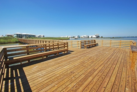 Just outside the home is a brand new community pier
