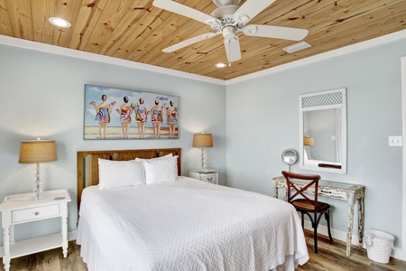 Guest bedroom 1 offers a queen bed, sleeping 2 guests