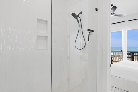 Featuring a walk-in tile shower