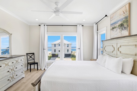 The master bedroom features a King bed, TV and private bathroom