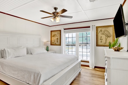 Master bedroom with a king bed