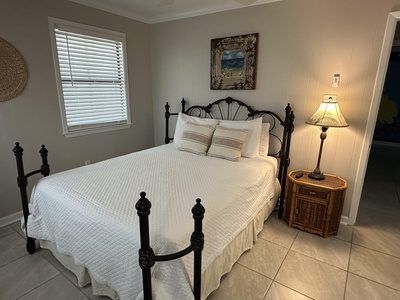 Bedroom 5 features a queen bed and TV
