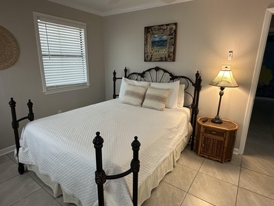 Bedroom 5 features a full bed and TV