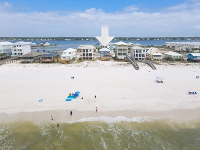 View of the 6 bedroom home from the water