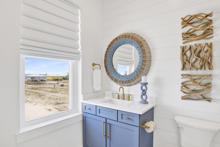 The private bathroom has a single vanity