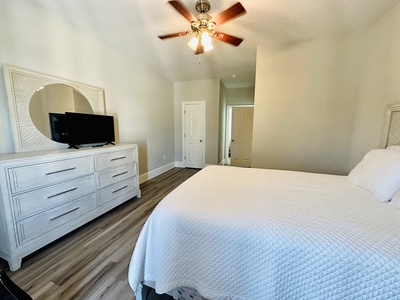 Bedroom 3 features a TV and a private bathroom