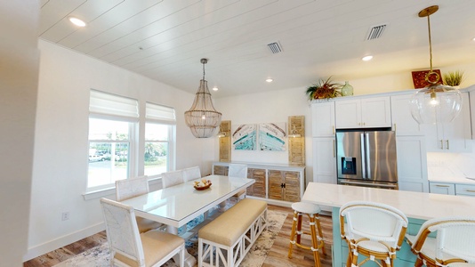 Dining area with a large table that seats 8