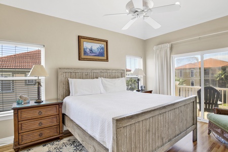 The primary bedroom has balcony access and a private en suite