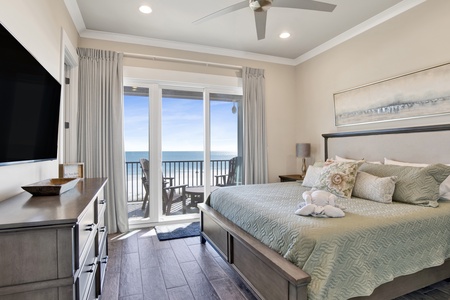 2nd floor SW bedroom 5 with a king bed, TV, Gulf views and balcony access
