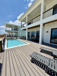 Enjoy the covered and uncovered balcony with views of the Gulf