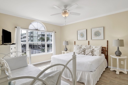 Master bedroom with TV and private bathroom