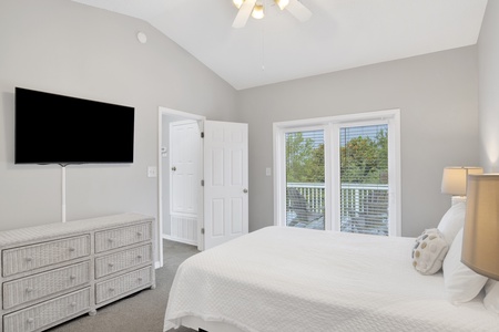 Bedroom 3 has a private balcony, TV and Queen bed, sleeps 2