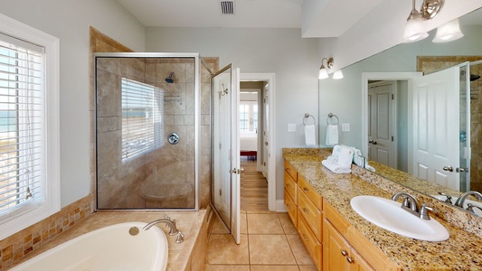 Private bath in Bedroom 6 with a jetted tub and walk-in shower