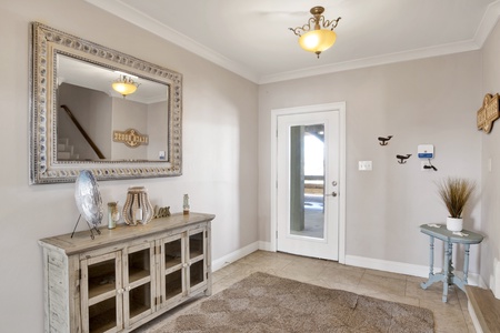 Fully enclosed entrance located in the carport