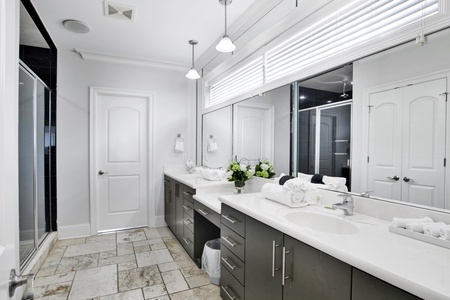 The private bath in bedroom 7 has a double vanity