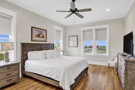 The primary bedroom has a private bathroom and water views
