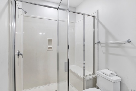 The master bath has a large walk-in shower