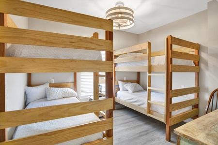 1st floor guest bedroom with 2 sets of twin bunks, sleeps 4