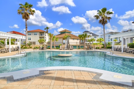 The spacious pool area has 2 pergolas