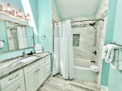 The master bath has a tub/shower combo