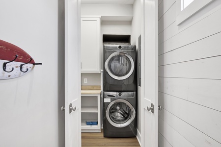 The laundry room, located on the 1st floor has a full size washer and dryer