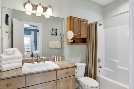 Master bathroom features a shower/tub combo