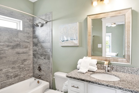 Private bath in Bedroom 2 with a tub/shower combo