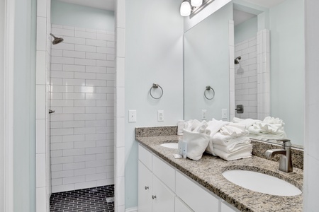 There is a private bathroom in all 4 Master bedrooms with a walk-in shower and double vanity