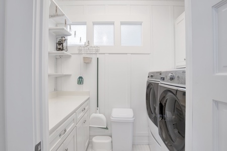 1st floor laundry room with full size washer and dryer