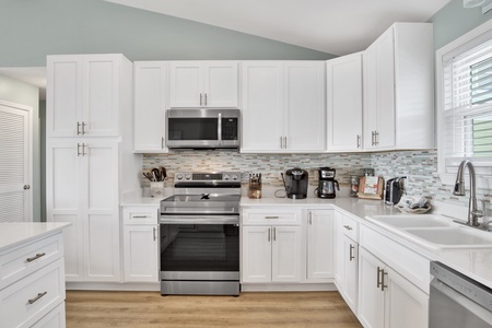 Beautifully updated kitchen with all of the small and large appliances needed to prepare your meals