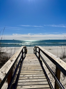 Private boardwalk to the white sandy beach and sparkling Gulf