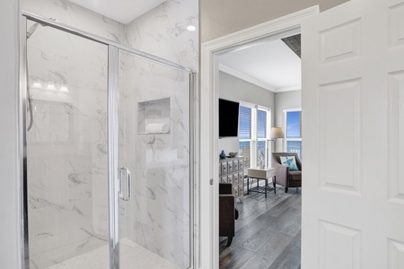 A walk-in tile shower