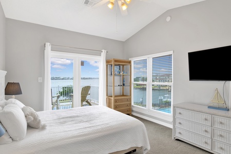 Bedroom 2 has private balcony access, TV, attached bathroom and Queen bed, sleeps 2