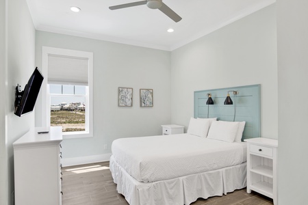 Guest bedroom, located on the 1st floor with a private bathroom, Queen bed and TV