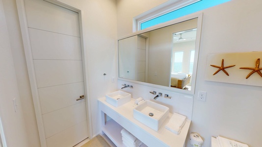 There is also a double vanity in the bathroom in Bedroom 3