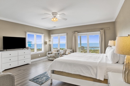 2nd floor master bedroom with balcony access, TV and private bathroom