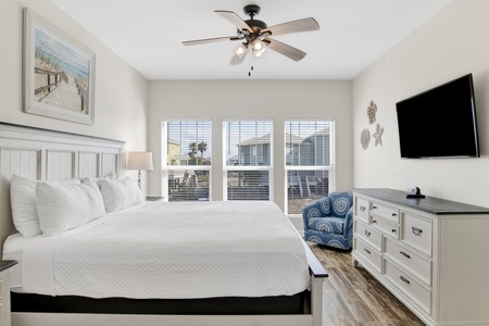 The master bedroom is on the main living level with a king bed