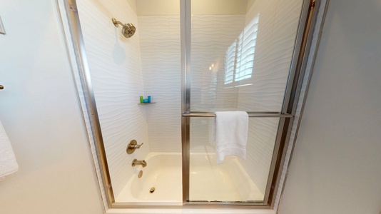 1st floor bathroom with a tub/shower combo