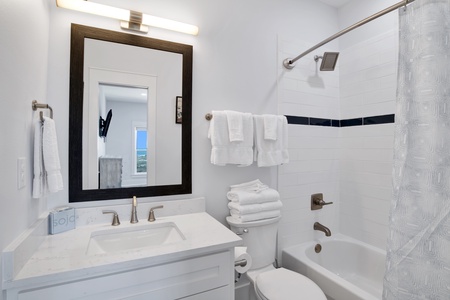 Summertime Blues I-The private bathroom for bedroom 2 has a tub/shower combo