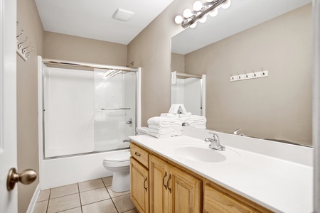 2nd floor shared bathroom has a tub/shower combo
