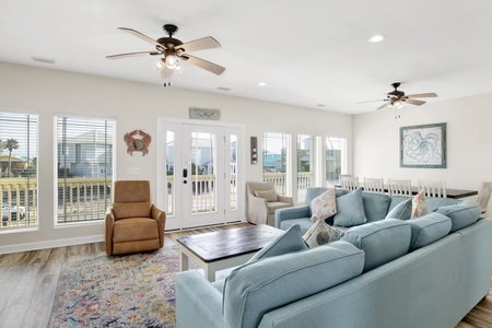 Spacious living area with deck access and views