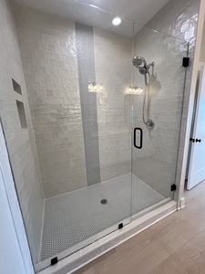 Master bathroom with a walk in shower