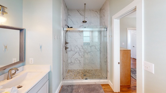 The Master bath has a large walk-in shower