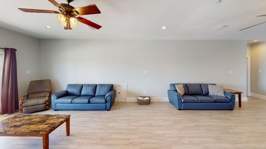 There are 2 sleeper sofas, TV and another table for games puzzles and snacks