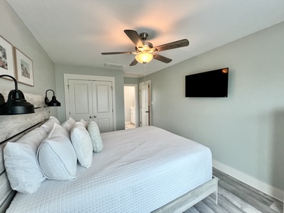 Bedroom 2 has a TV and Queen bed, sleeps 2