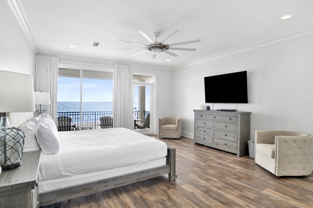 Bedroom 6 has fantastic views, balcony access, ceiling fan, TV and a private bathroom
