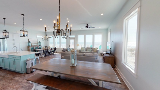 Living space has 2 tables plus bar seating