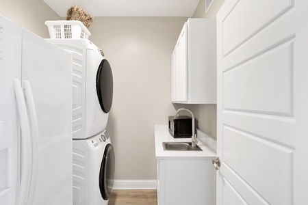 Full size washer/dryer, 2nd fridge, sink and microwave in the laundry room