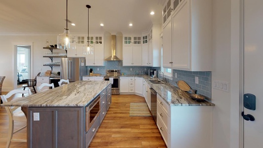 Kitchen with island and oven