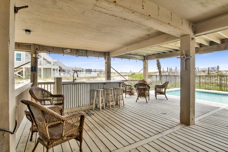 Outdoor bar underneath the home